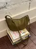 Nova bolsa versátil de camurça para axila, bolsa de ombro com franjas para primavera/verão 2026 para mulheres