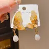 Pendientes de Aguja de Plata Lujo Ligero Perla de Imitación Cristal Mariposa Gota de Agua Franceses de Gama Alta Exquisitos Únicos de Nicho Elegantes