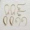 Aretes de gancho dorado retorcido con chapado de retención de color de aleación de metal accesorios para aretes materiales crudos para aretes DIY venta al por mayor