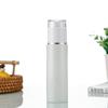 Botella de vidrio blanco para loción, botella con atomizador, botella vacía, botella de recarga de líquido para esencia cosmética, set de botellas para productos de cuidado de la piel, venta al por mayor