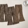 Pantalones Estilo Coreano para Niños 2026 Otoño Nuevo Estilo Moda para Bebé Versátiles Ajuste Delgado Estampado de Leopardo Lunares Pantalones de Campana Pantalones Largos Modernos