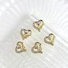 Joyería para uñas estilo lujo ligero amor hueco joyería de aleación aleación roja día de san valentín joyería para uñas accesorios al por mayor