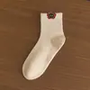 Calcetines Calcetines de media pantorrilla Otoño e invierno Calcetines deportivos para estudiantes Dibujos animados lindos Lunares Gasa Transpirable Absorbente de sudor Algodón peinado Calcetines cortos