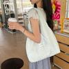 Nova Bolsa de Lona Bordada Floral Vazada para Primavera e Verão Feminina Fashionável Versátil Bolsa de Ombro Grande Capacidade Bolsa Tote para o Dia a Dia
