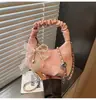 Bolso de Mano de Nicho Estilo Coreano Transfronterizo Bolso Dumpling para Mujer Otoño 2026 Nuevo Plegado Casual Versátil Bolso de Hombro Cruzado