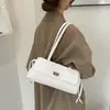 Bolsa feminina com padrão de losangos, novo modelo de outono 2026, bolsa de ombro e axila de grande capacidade, nicho de luxo leve de alta qualidade para o dia a dia