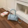 Bolsa de Bolos Nueva de Estilo Coreano para la Primavera 2026, de Nicho, Simple y Exquisita para Mujer, Bolso de Hombro Cruzado de Moda y Versátil para el Trayecto