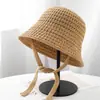 Sombrero de pescador de punto calado minimalista coreano para mujer, estilo casual con cordones, hace que la cara se vea más pequeña, tiene un aspecto de alta gama, adecuado para vacaciones