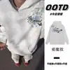 Novo design americano de streetwear estilo Harajuku, apresentando um moletom com capuz estampado para homens e mulheres, um top/jaqueta solto e casual para outono e inverno.