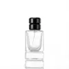 Botella de perfume de vidrio de moda de 50 ml, spray tipo presión, niebla fina, sub-botella cosmética, botella de vidrio de perfume cuadrada