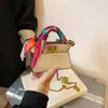 Bolsa Infantil 2026 Novo Modelo Alta Qualidade Design de Nicho Versátil Mini Ombro Transversal Mini Batom Pequena Bolsa Quadrada