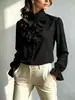 Camisa vintage con cuello alto fruncido, tela texturizada plisada, exquisita tapeta de botones, mangas largas holgadas
