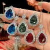 2026 Nova Joia Zhuangshengsheng Base de Cobre Banhada a Ouro Pingente Anel de Esmeralda Sintética Azul Paragon Gota 13*18