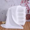 Toalla blanca al por mayor hotel salón de peluquería baño desechable toalla blanca salón de belleza sudoración vaporización absorción de agua no suelta pelo