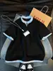 Camiseta de Verano para Hombre de Marca de Moda Estilo Americano Bloque de Color Rayas Cuello en V Manga Corta Camiseta Henley Falsa de Dos Piezas Camisa Polo de Media Manga para Pareja