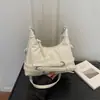 Bolso de axila moderno y versátil para mujer, bolso de hombro casual de moda ins coreana, bolso cruzado de diseño nicho para el otoño de 2026