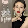 Aretes de Estilo Exótico de Venta Caliente Retro Literario Clásico Dignificado Ganchos para la Oreja Versátil Hueco Moda Borla Colgantes