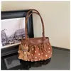 Bolso de mano de comercio exterior al por mayor con lazo y lunares para mujer, nuevo de moda 2026, bolso de hombro de alta gama para el trabajo