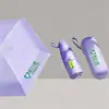 Sombrilla de cápsula con logo personalizado 50% de descuento, sombrilla para el sol, sombrilla para la lluvia, de doble uso para sol y lluvia, sombrilla portátil con protección UV al por mayor