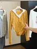 Nuevo top de punto con capucha a rayas estilo coreano para mujer, imitación de dos piezas, corte holgado, adelgazante, moderno y a la moda