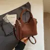Bolsa canasta de verduras de nicho 2026 nuevo estilo de moda bolsa de cubo de mano para salir de compras, para el trabajo, bolsa cruzada al por mayor