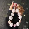 Nueva Cadena para Teléfono Móvil de Bolas de Pelo, Estrella de Mar, Concha, Perlas para Otoño e Invierno, Moda para Mujer, Cadena Pequeña con Aroma para Teléfono Móvil, de Mano, para Muñeca