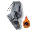 Calça casual masculina 2024 outono e inverno nova forrada com fleece espessa estilo coreano bolso na ponta do pé zíper calça plus size geração