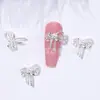 Famosos en Internet arte de uñas simple punta del dedo lazo textura de joyería todo-partido mariposa aleación de metal accesorios de diamantes de imitación