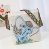 Atacado de fábrica nova bolsa mensageiro de textura de desenho animado estilo estrangeiro dupla face casual bordado estilo étnico bolsa de lona