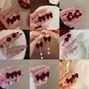 Pendientes festivos de terciopelo rojo con lazo para mujer, pendientes largos con borla floral dulces y elegantes para otoño e invierno