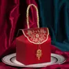 Caja de dulces de boda de alta gama, nueva caja de dulces de boda de estilo chino, caja de cartón vacía, bolsa de dulces, caja de embalaje de regalo de mano al por mayor