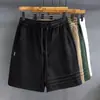 Diseño de Tres Rayas de Alta Gama Peso Pesado Deportivo Casual Pantalones Cortos Pantalones de Hombre Verano Sueltos Pantalones de Cinco Puntos Pantalones Deportivos Americanos