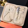 Set de 9 Piezas de Herramientas de Acero Inoxidable para Manicura y Cuidado de Uñas, Set de Tijeras para Uñas, Tijeras Completas para Cejas, Cuchara para Oídos, Set de Cortauñas al por Mayor