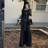 Conjunto extremadamente elegante de estilo coreano, un conjunto completo para principios del otoño de 2026, nuevo conjunto de dos piezas para mujer con top gris de manga larga y pantalones anchos