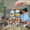 Cascabel Campana de Mano Carrillón Colgante de Bolsa Hecho a Mano Rayo de Sonido Cascabel Colgante Fruta Negra Indonesia Cáscara Fábrica Venta al por Mayor