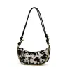 Bolsa Casual Nicho Padrão Vaca 2024 Nova Moda Tendência Costurada Croissant Bolsa Transversal Casual de Lona