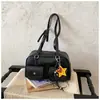 Moda transfronteriza diseño de doble bolsillo bolsa de boliche para mujer nuevo tacto de alta gama bolsa de almohada de una sola pieza bolsa de axila retro moderna