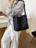 Bolso cruzado de patrón tejido casual, bolso de hombro de nicho retro de lujo ligero, bolso versátil de cuero suave de alta gama para madre e hija