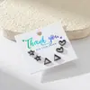 Venta al por mayor de pendientes minimalistas geométricos, ligeros y lujosos para mujer, con combinaciones de acero inoxidable en forma de estrella de cinco puntas, triángulo y corazón.