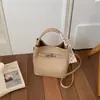 Bolso de cubo de mano de moda coreana más vendido para mujer, nuevo bolso de hombro de moda 2026 para el día a día, bolso cruzado versátil