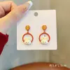 Pendientes festivos de Año Nuevo rojos, pendientes de año de nacimiento de dragón femenino, pendientes de diseño de nicho de alto sentido, pendientes de Año Nuevo de otoño e invierno