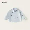 A coleção de outono da Bangxuan para crianças inclui camisas com colarinho para meninos e camisas de manga comprida para meninas com bordado de coração.