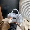 Bolsa de Boliche Prata de Luxo de Nicho para Mulheres 2026 Nova Versátil Casual Bolsa Transversal Estilo Ins Bolsa de Mão Bolsa Almofada