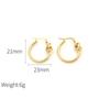 Aretes de lujo franceses de oro de 18k y acero de titanio para mujer, aretes circulares anudados de personalidad nicho, aretes de alta gama al por mayor