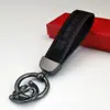 Colgante de Llavero de Cuero Gamuzado de Gama Alta para Coche Llavero con Logo de Coche Decoración de Llavero Colgante de Cintura de Metal Venta al por Mayor