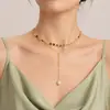 Moda de joyería transfronteriza europea y americana diseño de moda accesorios metálicos collar de borla de perlas con lentejuelas de oblea de doble capa para mujer