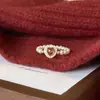 Anillo de Corazón de Granate Borgoña de Alta Imitación con Perla de Imitación Shijia para Mujer Nuevo Joven Lujo Gama Alta Anillo de Cuerda Elástica
