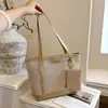 Bolsa de alta qualidade com textura, grande capacidade, 2026 Verão, nova, estilosa, simples, elegante, versátil, de ombro único, de mão, tote bag, transversal