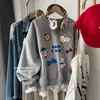 Nueva sudadera de otoño e invierno estilo coreano con bordado pesado, lazo flocado, diseño de cachorro, juvenil, versátil, con cuello redondo para mujer