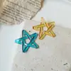 Pendientes de estrella de cinco puntas huecos coloridos transparentes de Yang Xiaolin, accesorios de bricolaje hechos a mano, joyería al por mayor